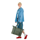 Travel tote bag with trolley sleeve